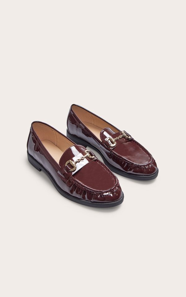 d8b3c058ec953a2b3d192bfd00bbf1c62ccde50b_CNN2127_2_burgundy_patent_loafer_with_gold_buckle_detail