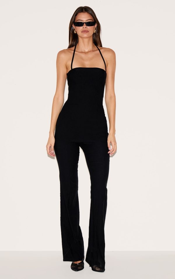 d94bdf8c020da9c1d8b860a58b216bee269555cb_CNL7235_1_black_woven_thin_halter_overlay_detail_jumpsuit