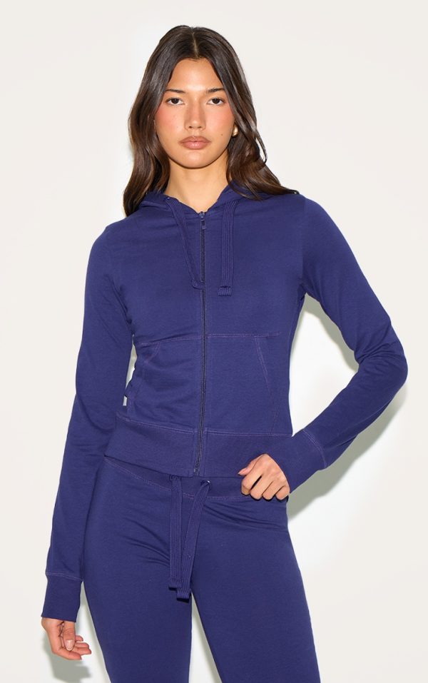 d9dc8ab5aa8fdbd30366eabf6a8b9e04f47f27f8_CNN0642_1_indigo_blue_zip_up_fitted_track_top