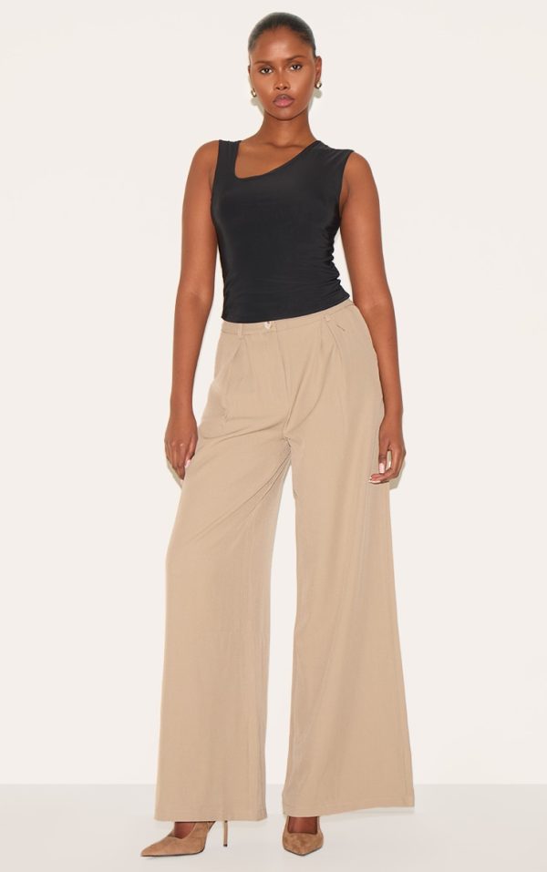 da6d4f66f43e526fba52303e9d1f2df47f3506a2_CNL8970_3_black_slinky_asymmetric_detail_longline_vest_top