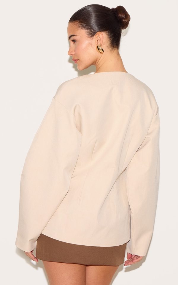 da9a23bef1c9b2c386b5e400d85e693329ef5a04_CNM0741_2_stone_cocoon_sleeve_cinched_waist_blazer