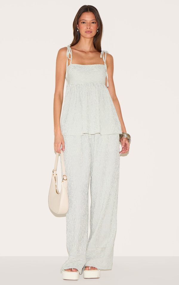 dad05ff3373c4453114d8bb82649c0b1c5461d25_CNM1910_1_sage_green_woven_textured_striped_straight_leg_trousers