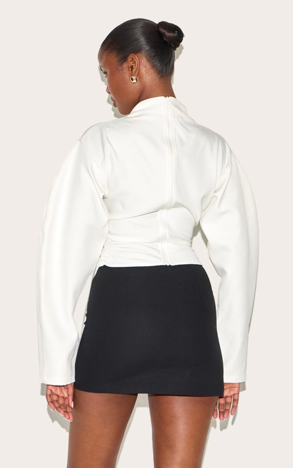 dc438b7d7c52ad1e620c42453c4757a1fdc0159b_CNM3881_2_cream_woven_highneck_fitted_top