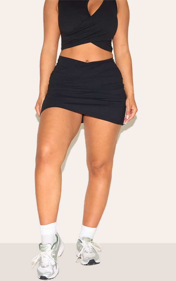 dc973701a0f152cf3be798b4997d10458dbf7dc4_CNM6294_2_shape_black_active_wrap_over_waist_skort
