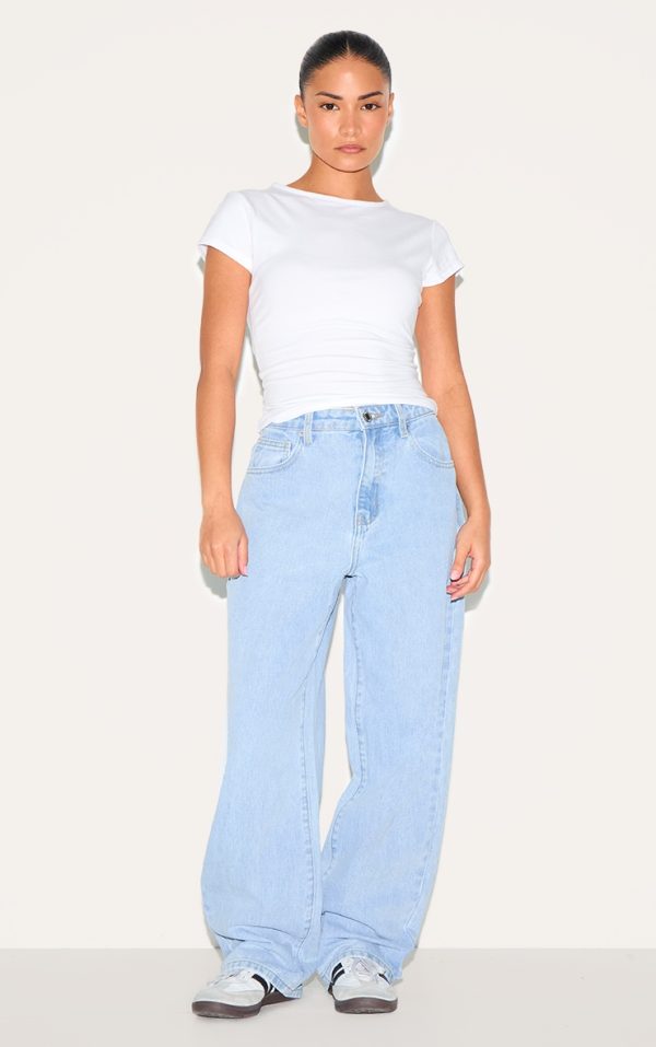 dcd04b5a5f50dd95cea5f6d9dea80aa61af81c91_CNL9991_1_prettylittlething_petite_light_blue_wash_high_waist_boyfriend_jean