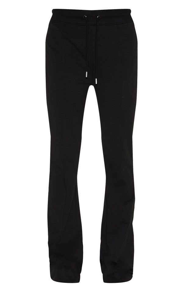 dd6ea8161cd64d48c86629febc8161b378a8f4a0_CNM2916_5_black_cotton_seam_detail_mid_rise_skinny_flares