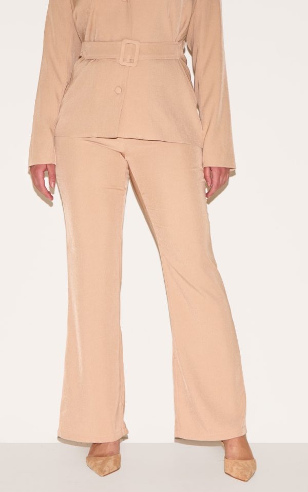 ddda6ef2dd0fda9ece5350f9b28e4e8a71ad2fb1_CNM1379_2_shape_beige_woven_highwaisted_flared_trousers