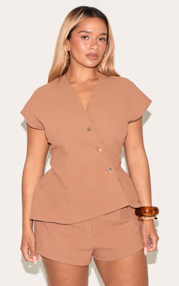 de050684c96c0dc72ff4f9c80702a1621a3e3f7f_CNM6342_1_shape_mocha_linen_asymetrical_gold_hammered_button_adjustable_waistcoat