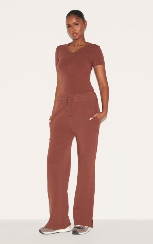 de0d08b580b6ae203a9c39d896681ea64596a8ff_CNL8034_3_chocolate_premium_interlock_button_down_short_sleeve_bodysuit-1