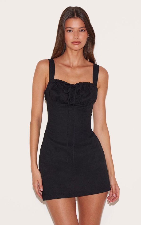 de53ee2acae021cf3250df6eba62888fe1c37d41_CNL8931_1_black_tie_detail_shift_dress