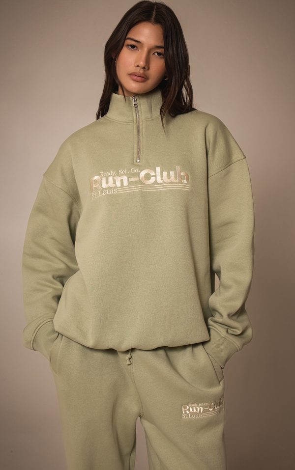 debd1975360b9229050f6d0cfeed2a18e2519426_CNM0179_4_sage_embroidered_half_zip_sweatshirt