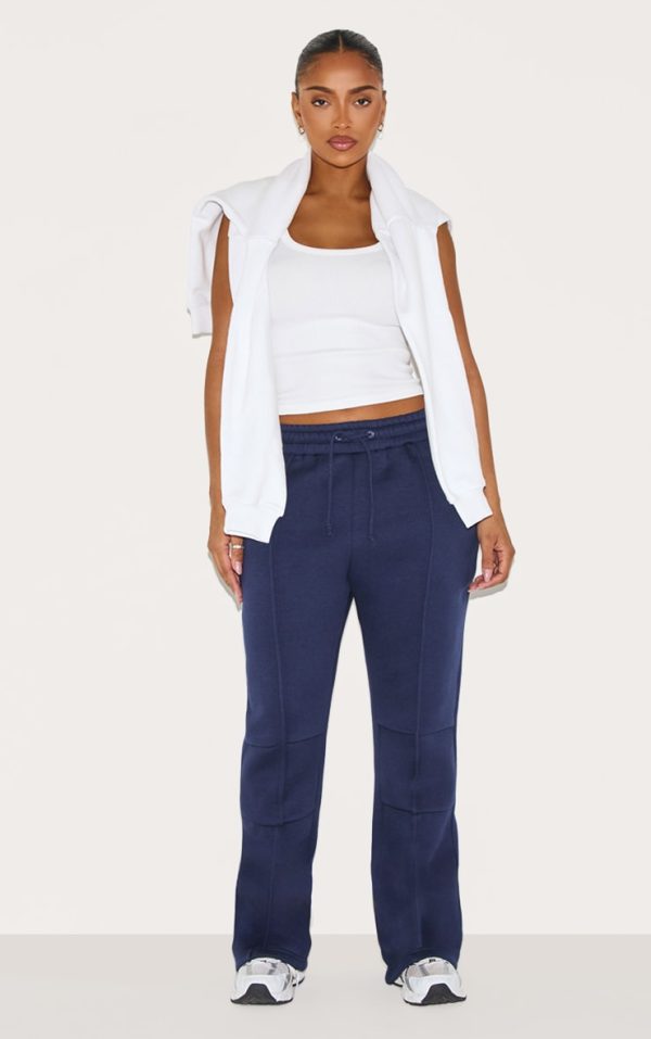 df57cf64a688495d1b0aa12da248210804a930bb_CNM0018_1_shape_navy_highwaisted_pintuck_flared_joggers