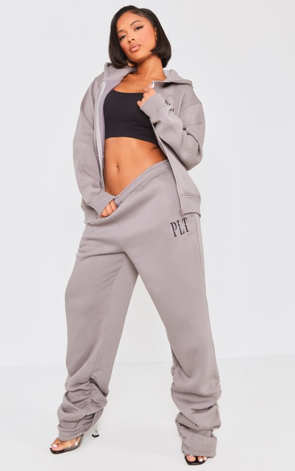 dfa5d7cf604bc2bf4c668a2393e5a0a87c56f8b8_CNG6797_1_prettylittlething_shape_charcoal_embroidered_ruched_leg_joggers