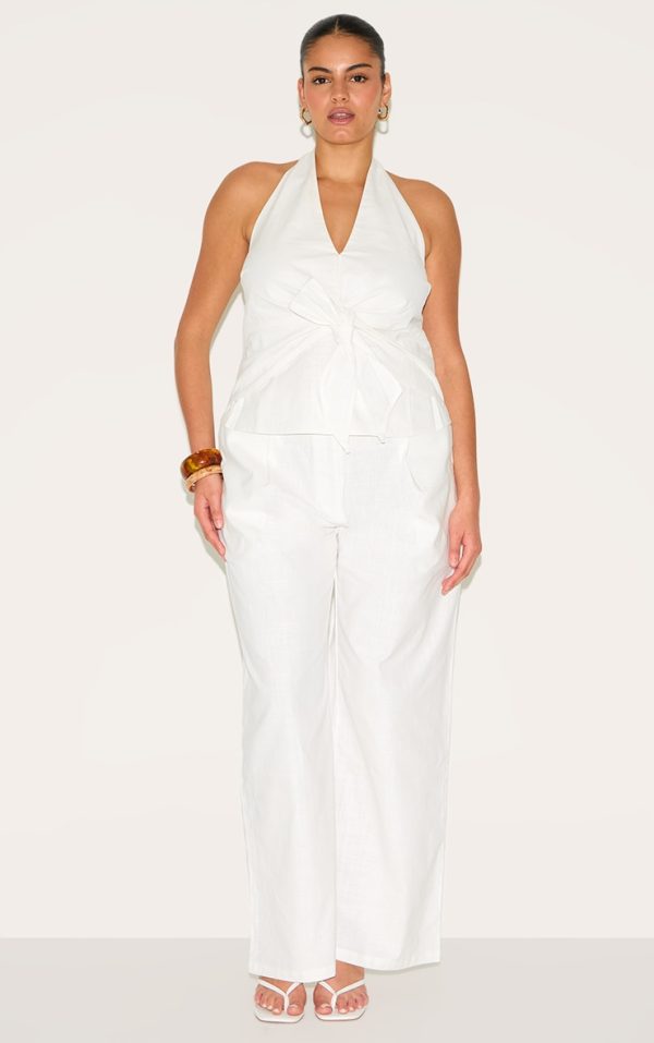 e0426660df2d42f99be18cd95ae34bcee3df24c1_CNM6532_3_plus_white_linen_twist_front_halter_neck_top