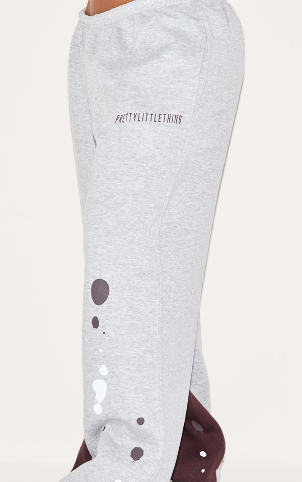 e09ea52a888a9decbff62a9af6a973ac15f8ec01_CNK2552_4_shape_grey_marl_printed_paint_splat_detail_wide_leg_joggers