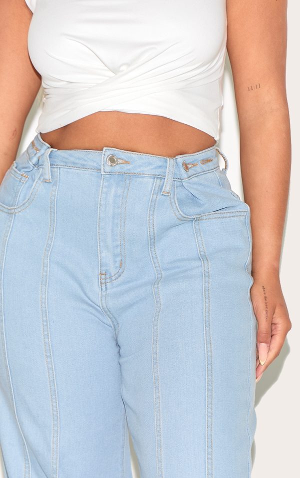 e139ea42d23050047e568b93714e7886b06e3552_CNM2072_4_shape_light_blue_stretch_denim_highwaisted_adjustable_button_wide_leg_jeans