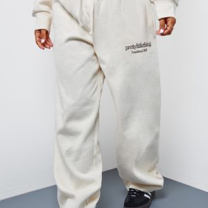 PRETTYLITTLETHING Petite Cream Premium Print Wide Leg Joggers