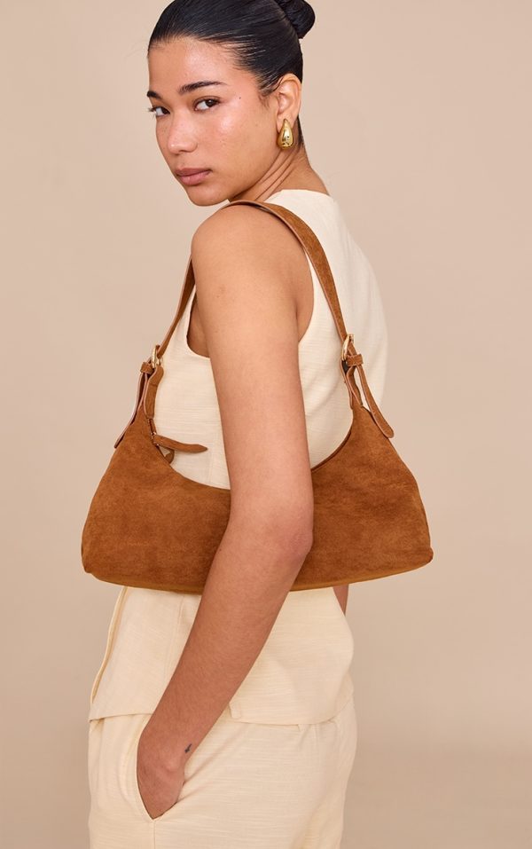 e2233774d5b3a42c5e8dfd07d26e9fff324214b2_CNM3902_5_tan_suede_elongated_curved_shoulder_bag