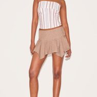 e27ad877f91875324ac3f648aa15046dbaee50ba_CNM0486_1_chestnut_drop_waist_hanky_hem_mini_skirt