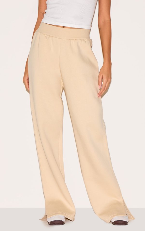 e2cd467bd5bf4abb70c946bf719cbec3da6efbfb_CNM5189_2_stone_split_hem_flared_joggers