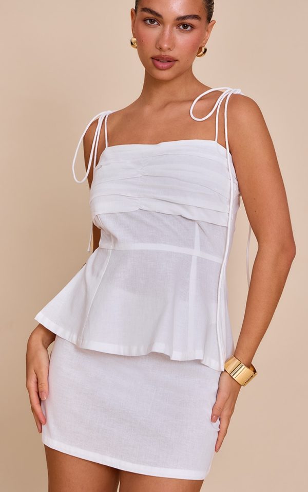 e32be6309d00371cf996c48454d6d98e4ad38e1f_CNM6094_1_ivory_mid_rise_mini_skirt