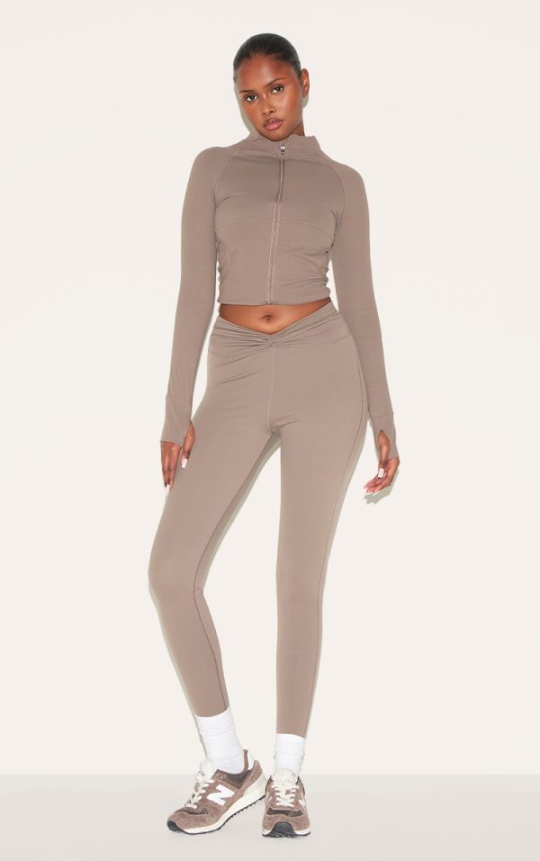 e330a026b9e0aedd4648115b54160dfb8d501f34_CNL5090_1_brown_sculpt_twist_front_gym_leggings-1