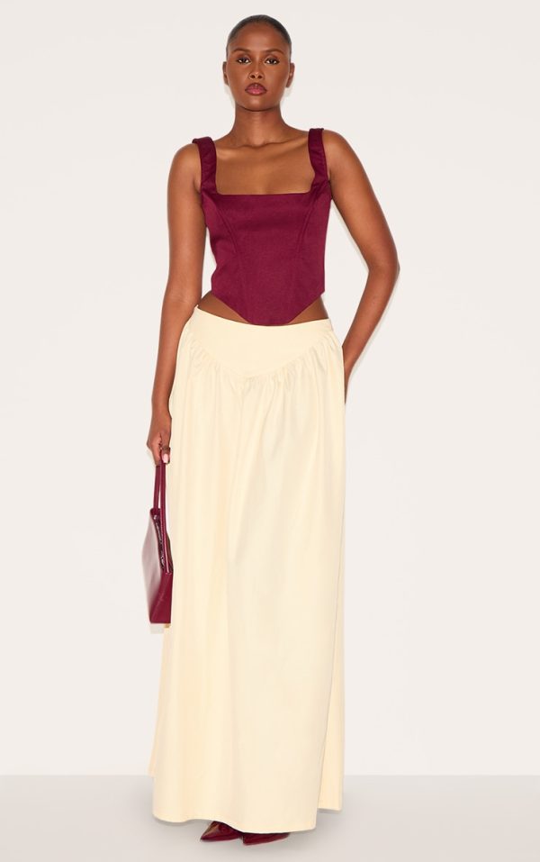 e3ea935348c8f9ed981b91022d1d69d1a6a712ee_CNL9321_1_almond_dipped_waist_structured_a_line_maxi_skirt-1