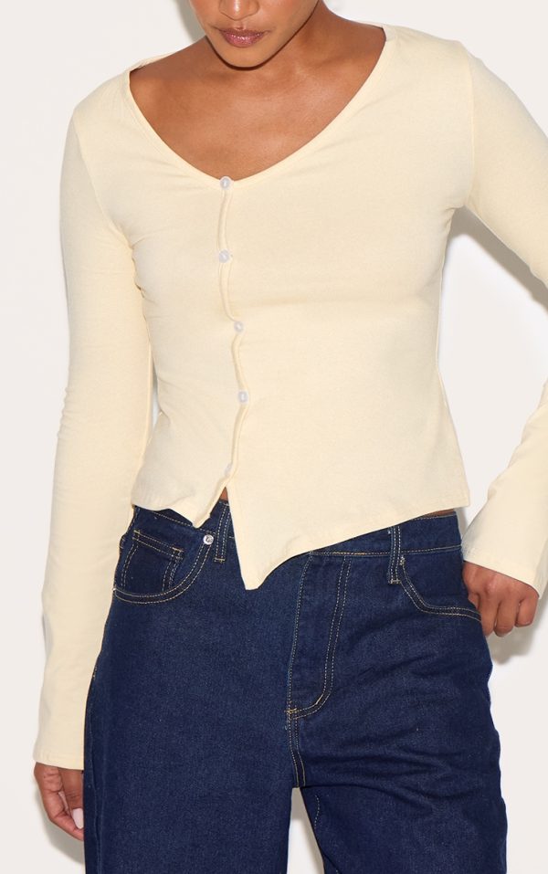 e4a84dfe81340d71168c77efd488339361946856_CNM6354_4_almond_asymmetric_button_down_detail_long_sleeve_top