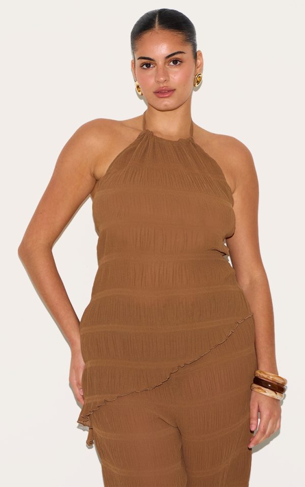 e540c73ea9465794963d686b7a944bfcf7dc7d28_CNM5044_1_plus_chocolate_textured_woven_backless_sheer_asymmetric_long_top