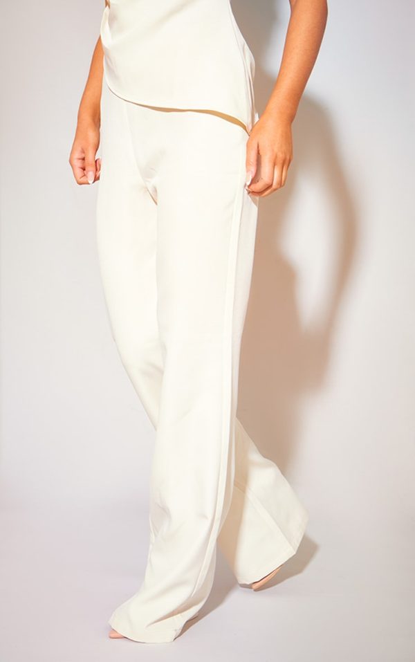 e5d30f9caa79416c1c309d9a66e821ed7e691ea1_CNH3088_2_cream_tailored_low_rise_skinny_flared_trousers