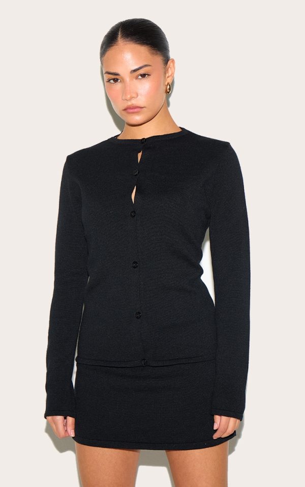 e5d7ff61638c12a26ef3f9e5c5f03e1c1bcdf249_CNM1888_4_petite_black_fine_knitted_mini_skirt
