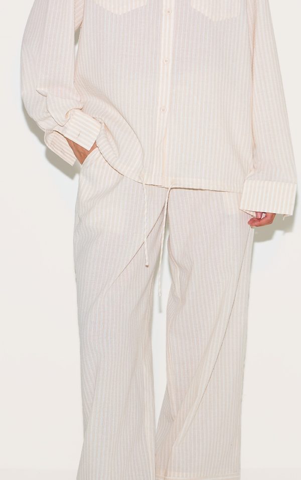 e64c6c10a180318a4de1c47c005fedf640731900_CNL9426_4_stone_striped_linen_drawstring_wide_leg_trousers