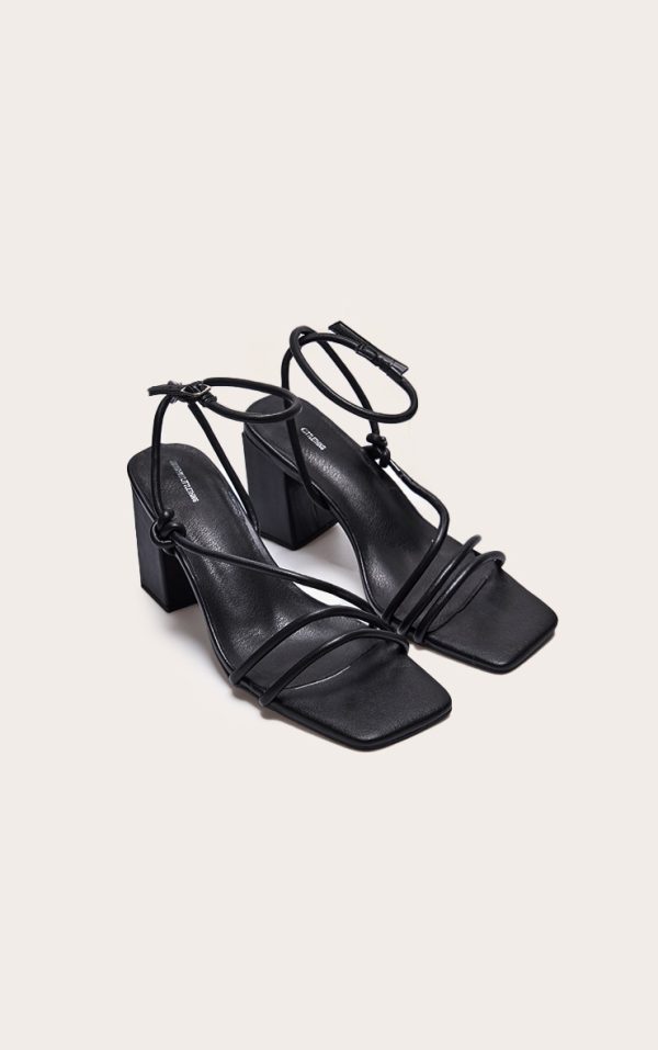 e65f204432cf105c285560673738a2ef4a85aa56_CNH9132_2_black_pu_square_toe_strappy_tube_asymmetric_block_heeled_sandals