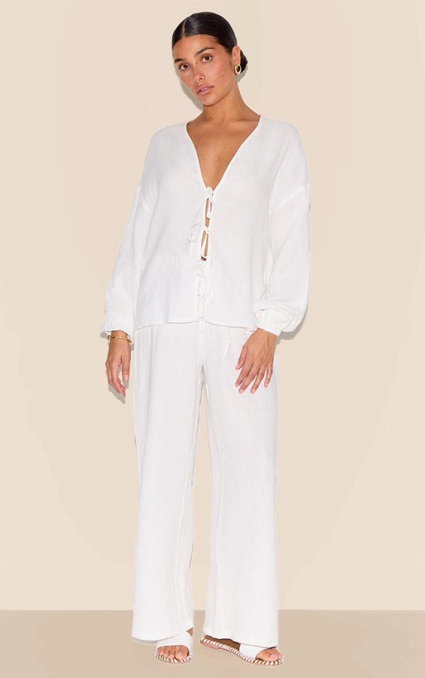 e6aced15c3c39896d7da5b7f738dd20665eda2aa_CNM3962_3_petite_white_cheesecloth_textured_tie_front_shirt