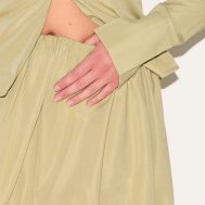 e70fe2e7eada745a159899999bb86b804bc0481f_CNM1019_5_shape_olive_tailored_puff_ball_mini_skirt
