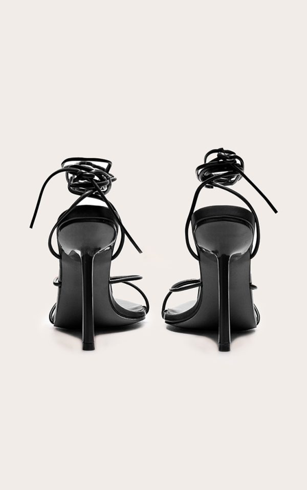 e8b6c13aaee1a6565da8230e7663d2f464895643_CNL8253_3_plt_label_black_strappy_tie_thong_heel