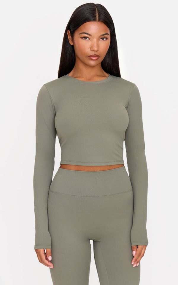 e8f43c4f5d372104ac0ac93878386dabc2a8aad7_CNL7012_1_olive_ultimate_sculpt_long_sleeve_crop_gym_top