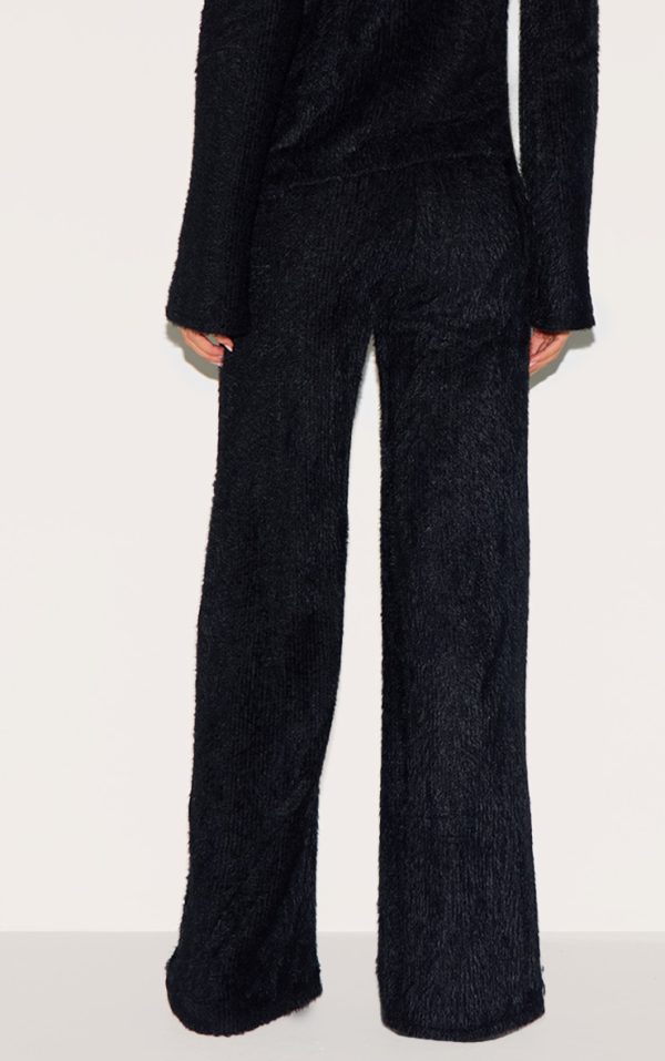 e8fc780ed76874c6f2a02324c04fe354eeead044_CNM2120_3_black_textured_wide_leg_low_rise_trousers-1