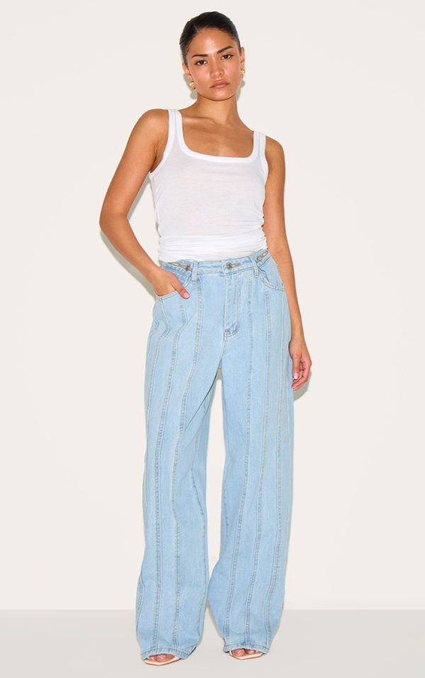 e9001744480cbb81a9d71108c9930a142f45a012_CNM2759_1_petite_light_blue_denim_seam_detail_jeans_with_adjustable_straps