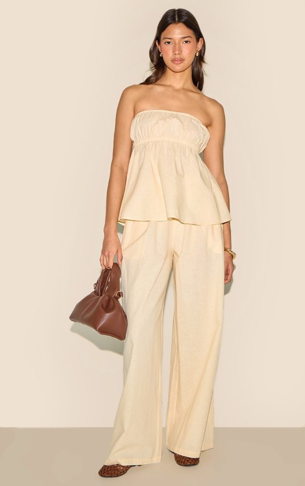 e9386185a3f028aec5c0f21dc5b09328a8d2e09c_CNM3176_3_butter_yellow_linen_look_peplum_bandeau_top