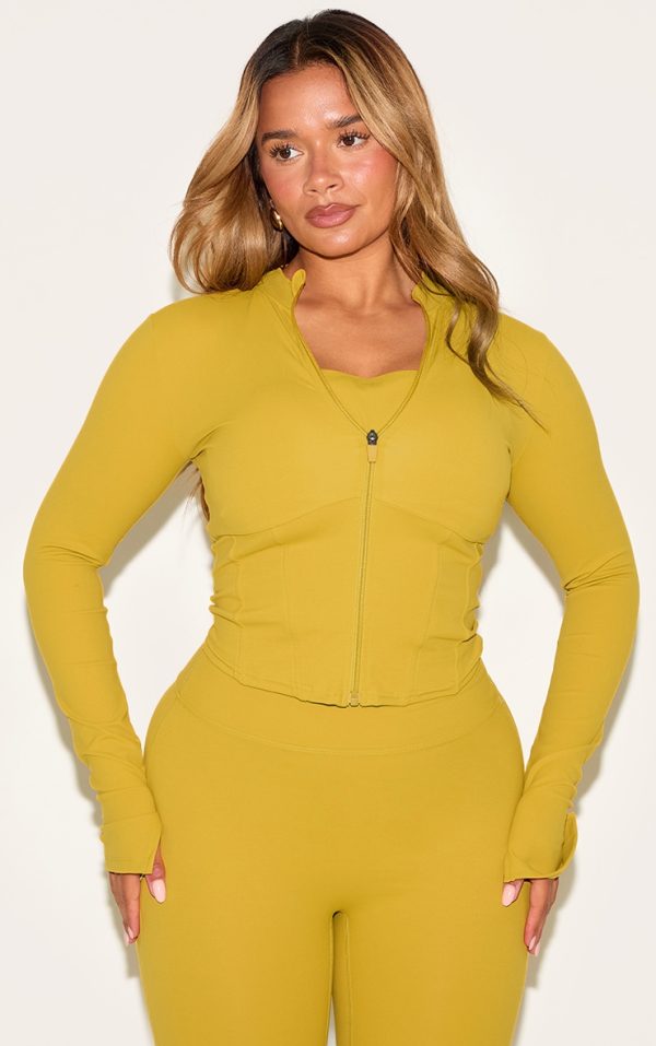 e93ed5eb082a1e6560e3735c9a32eefaf907c309_CNM6289_1_shape_olive_active_zip_front_seam_detail_jacket
