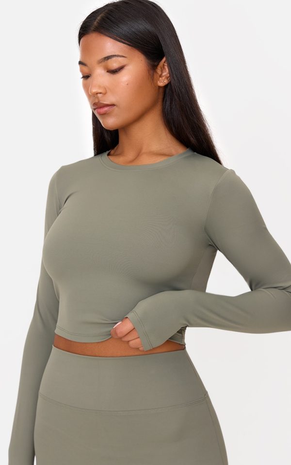 e953d748e9d6f692a7fd7df7a774080f49753a93_CNL7012_4_olive_ultimate_sculpt_long_sleeve_crop_gym_top