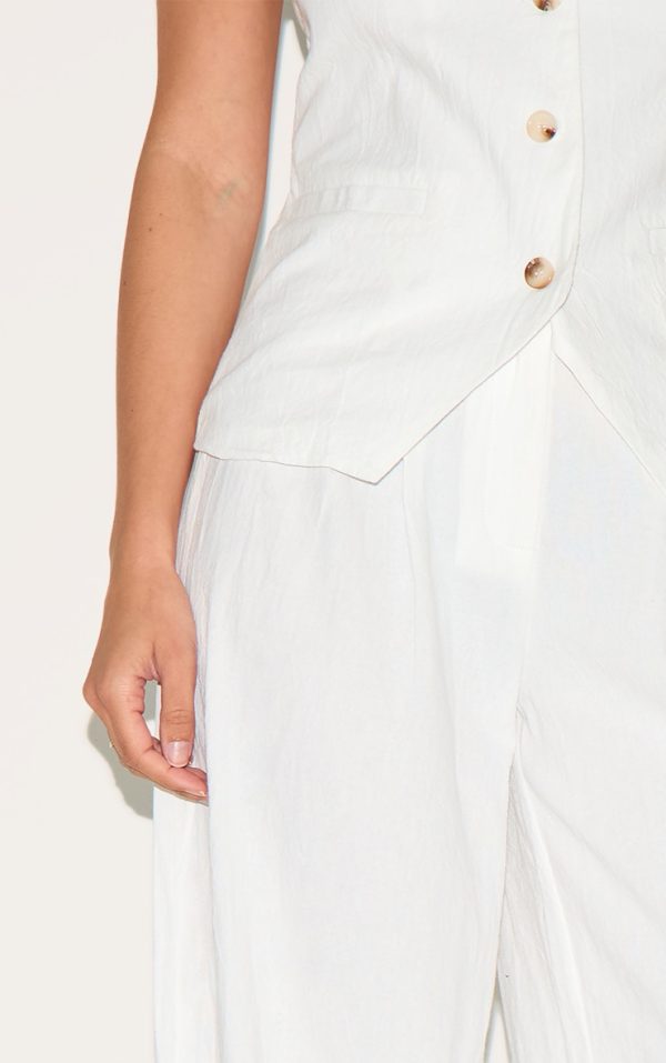 e958c1ad12aa938d7c8dde759c52e1ea592a0a2b_CNM4200_4_white_wide_leg_pleated_trousers