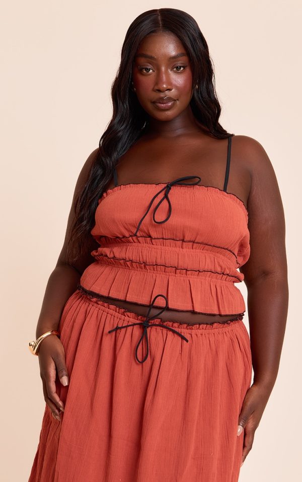 ea9de6dcd73c1f952463761f4db3990c0e05b857_CNM5070_1_plus_rust_cheesecloth_cami_contrast_top