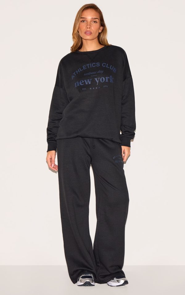 eae947db68df42e9ae881bbe52e8effe5eb14031_CNL9650_1_black_wide_leg_new_york_printed_joggers