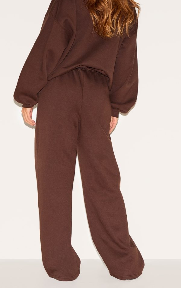 eb4e7414deb77eb4522a2571cce05d1611683238_CNM4805_3_chocolate_studio_archives_embroidered_thin_waistband_drop_crotch_joggers