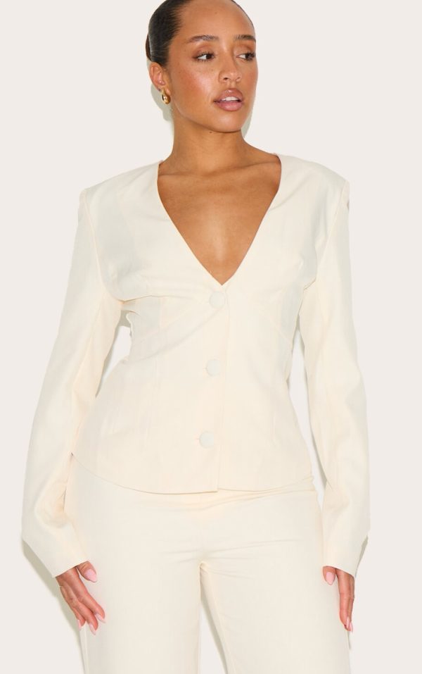 eb6c73fef90fd2da5a5216a5e0159a61f71bf13e_CNM0813_1_shape_vanilla_plunge_front_cinched_waist_blazer
