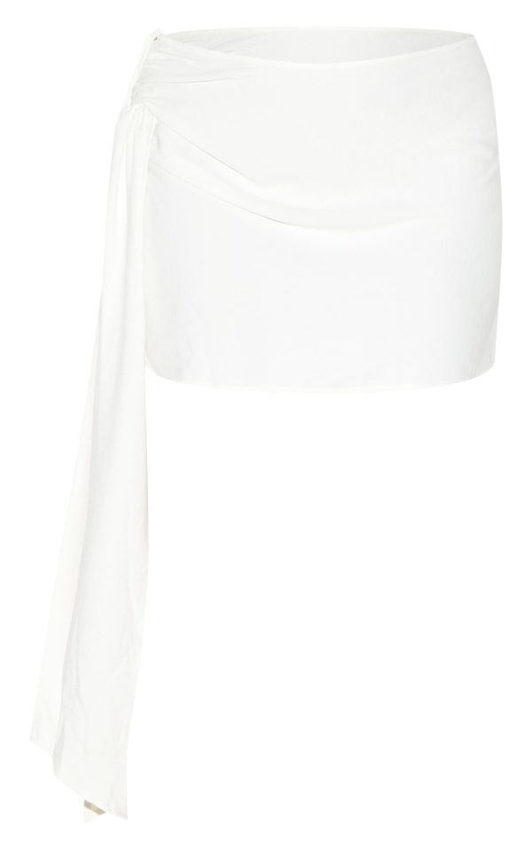 ec06b870e0b09dcd182ffdeef88786866f370ad5_CNM7765_6_plus_cream_floaty_woven_knot_side_mini_skirt