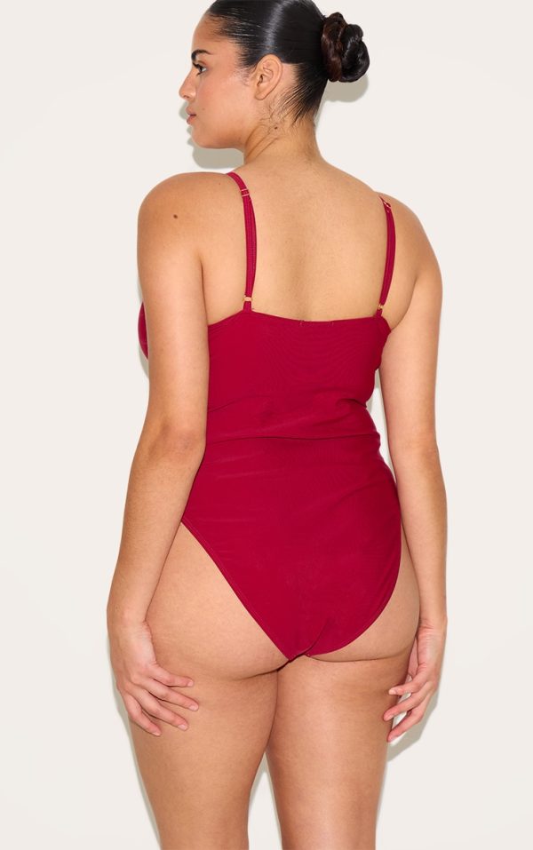 ec0964451e7ba59c441c9cf3b89f9967f4fa5860_CNM7882_2_plus_burgundy_knot_front_cut_out_swimsuit