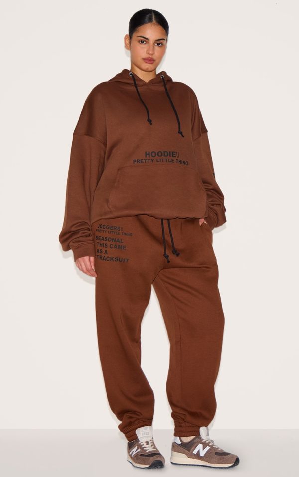 ec2103b288e6b320bd27d487ca0b5c99888fa77d_CNE5423_1_prettylittlething_plus_chocolate_slogan_print_joggers